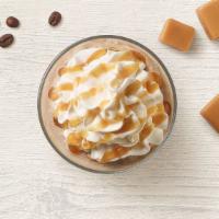 Frozen Caramel Cold Brew · 470 Cal. Caramel and an icy cold brew coffee blend topped with whipped cream and caramel syr...