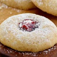 Raspberry Almond Thumbprint Cookie · 230 Cal. Almonds and a fruity hint of raspberry jam and powdered sugar. A perfect little tre...