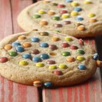 Candy Cookie · 420 Cal. Freshly baked sugar cookie topped with colorful milk chocolate candies. Allergens: ...