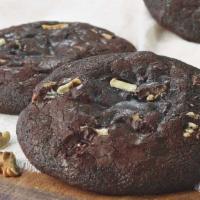 Triple Chocolate Cookie With Walnuts · 320 Cal. A freshly baked flourless chocolate cookie with a soft, brownie-like texture, made ...