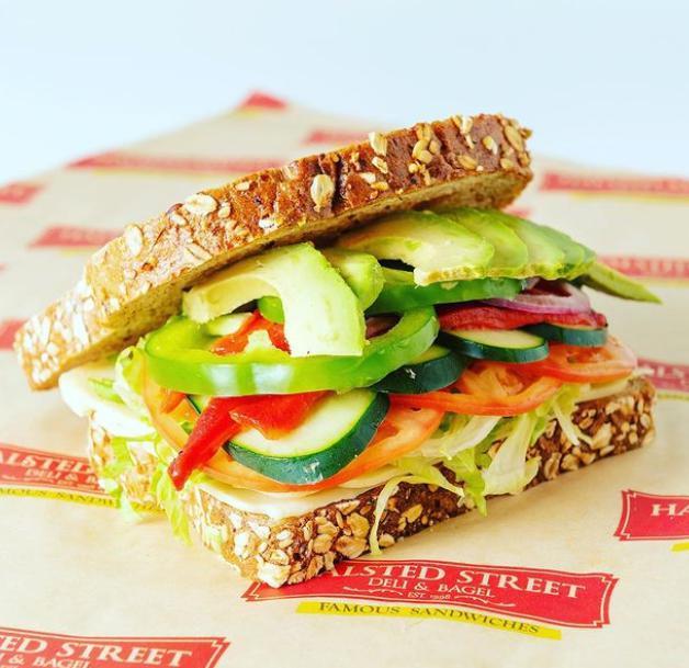 #6. Washington St. Sandwich · Veggie. Several layers of Swiss cheese topped with shredded lettuce, avocado, cucumbers, roasted red peppers, onion, green pepper, tomato, shredded carrots, with mayo served on honey wheat 8
grain bread.