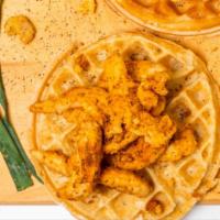 Ghost Town II Chicken and Waffle · The combination of juicy, tender chicken on top of a warm, Belgian waffle is decadent and ha...