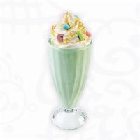  Sprinkled with Charms™ Shake · Lucky Charms™ Ice Cream topped with Whipped Topping, Gold Glitter, and Lucky Charms™ Marshma...
