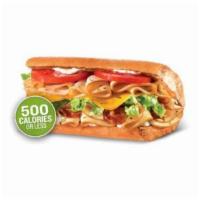 Ultimate Turkey Club Sub · Turkey breast, smoky bacon, all-natural cheddar, iceberg lettuce, tomatoes and mayo. 