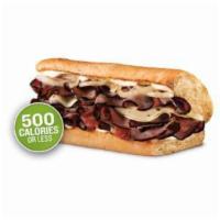French Dip Sub · With black angus steak, swiss, sauteed onions, creamy horseradish, and a side of Au jus.