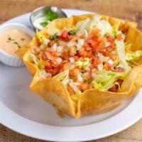 Taco Salad · Ground beef, chicken or pork. Served on homemade shell topped with rice, beans, lettuce and ...