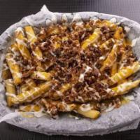 Loaded Fries* · Bacon, Ranch, Whiz on top of a basket of our Philly fresh fries, fried to perfection.