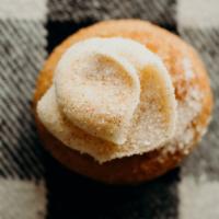 Cinnamon Roll Donut · Most popular donut- vanilla cream cheese. Served with cinnamon sugar.

