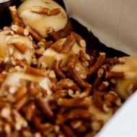 Salted Caramel Crunch Donut · Vanilla base with crushed pretzel and salted caramel - one of biggy's favorites.
