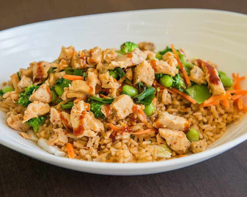 Spicy Teriyaki Chicken Bowl · Cilantro Brown Rice, Napa Cabbage. Steamed Carrots, Green Onions, Broccoli, Edamame. Honey-Chipotle Chicken. Sesame Ginger, Spicy Teriyaki Drizzle.
