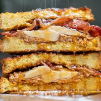 The Elvis · griddled cornflake crusted brioche french toast, peanut butter, bacon, bananas, honey