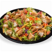 Crispy Chicken Salad · Served with your choice of Marzetti® dressing and topped with crispy chicken, chopped tomato...