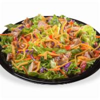 Grilled Chicken BLT Salad · Served with your choice of Marzetti® dressing and topped with grilled chicken, chopped tomat...