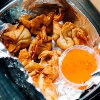 Curry Crab Rangoons · Fried wonton filled with curried cream cheese, real CRAB meat, and seasonings. 5 Rangoons pe...