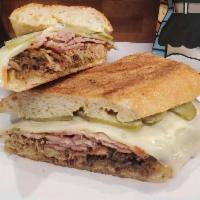 Cubano Sandwich · House-Smoked Pork, Beeler's Ham, Swiss, Pickles, Dijonaise on Zingerman's Toasted Baguette.
