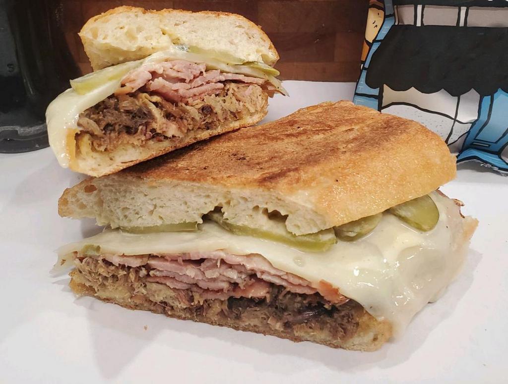 Cubano Sandwich · House-Smoked Pork, Beeler's Ham, Swiss, Pickles, Dijonaise on Zingerman's Toasted Baguette.