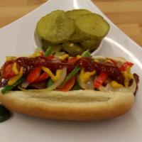 Hot Dog · Served with grilled onions, peppers, mayo, mustard and ketchup.