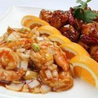S8. Dragon and Phoenix · A combination of crispy chunks of chicken in spicy honey sauce and jumbo shrimp, stir fried ...