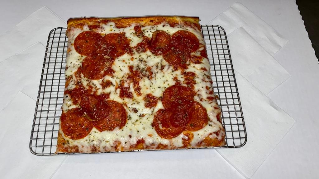 4 Slice Squares · Authentic Buscemi's square pizza topped with quality mozzarella cheese, pepperoni, a dash of oregano, and a drizzle of sauce on top. ** To add double of a topping, select it once in the 'Topping Choice' menu and once again in the 'Additional Toppings' section **
