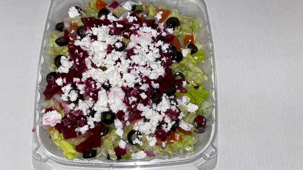 Medium Personal Greek Salad · With lettuce, tomatoes, red onion, beets, black olives, and feta cheese.