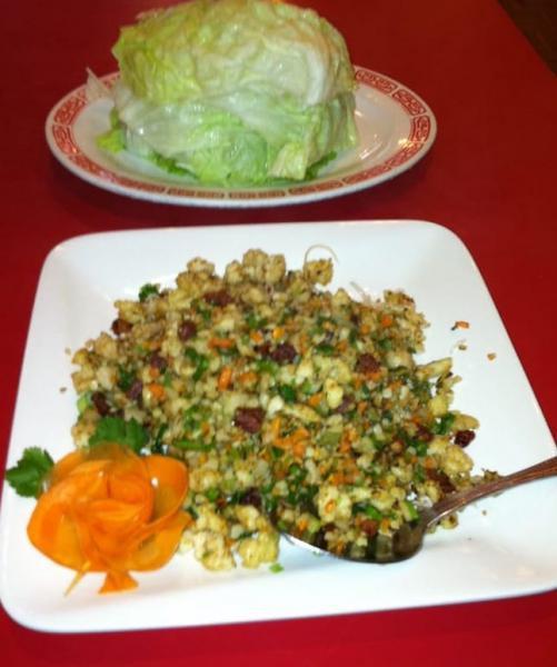 Minced Chicken Lettuce Wrap · Minced chicken with garlic, onion, hoisin sauce, soy sauce, rice wine vinegar and ginger in a lettuce wrap.