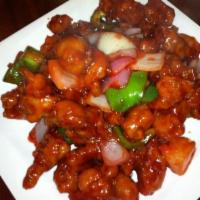 Sweet and Sour Pork · Lightly battered pork with pineapple, onions and bell peppers tossed in sweet and sour sauce.