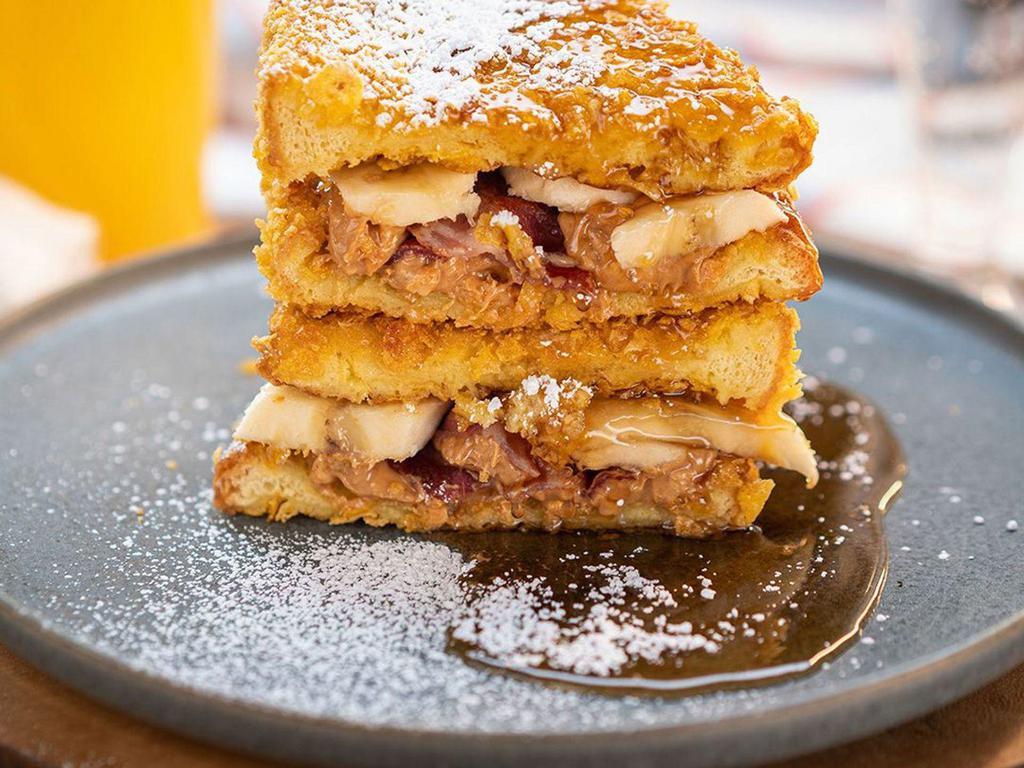 The Elvis · griddled cornflake crusted brioche french toast, peanut butter, bacon, bananas, honey