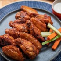 12 Pcs  All Natural Wings · All natural (no hormones or antibiotics)  chicken wings cooked to perfection. Choose your fa...