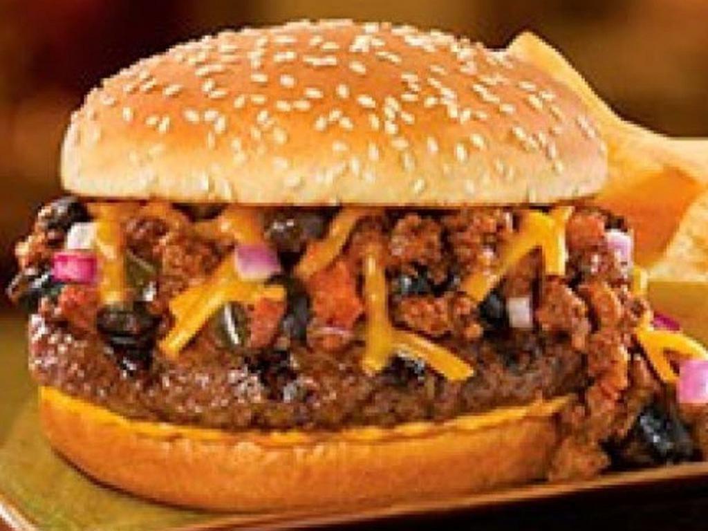 Chili Chili™ Cheeseburger Burger · You might need an extra napkin. Served open-face with a generous helping of Red’s Chili Chili™, Cheddar cheese, chipotle aioli and diced red onions. Cleanup crew not included.