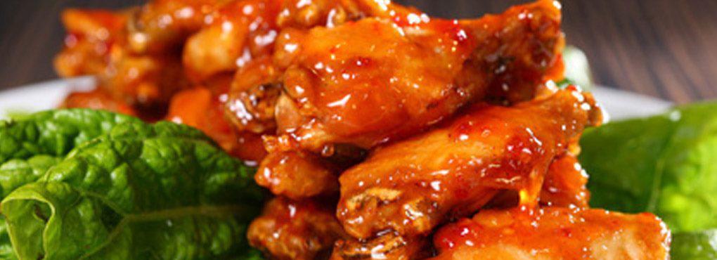 Tavern Wings · Oven-roasted wings flash-fried for a crispy finish served naked style or tossed in BBQ, buffalo, sweet chili, or turbo sauce. Served with ranch.  Add celery or blue cheese for an additional charge.