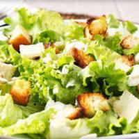 Caesar Salad · Crisp romaine lettuce tossed with creamy Caesar dressing, croutons, and Parmesan cheese. Add...