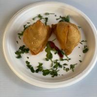 Samosa 1pc. · Fried pastry with savory filling such as spiced potatoes, peas and contain nuts.