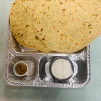 Aloo Prantha Special ( 2pcs. ) · Fried flat bread stuffed with potatoes and served with pickle and 4 oz. raita