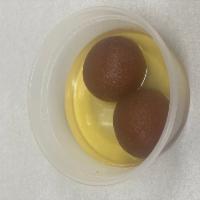 Gulab jamun · 2 pcs of hot Indian dessert consisting of fried balls of a dough made from milk solids, soak...