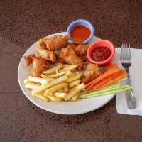 Lunch & Dinner Chicken Wings · Cooked wing of a chicken coated in sauce or seasoning.