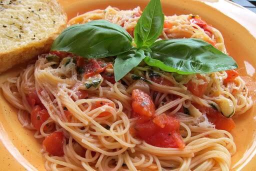 Capellini alla Checca · Angel hair pasta with fresh diced tomatoes, basil, olive oil and garlic.