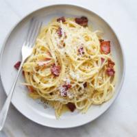 Spaghetti Carbonara · Pancetta and creamy Parmesan cheese and a touch of garlic.