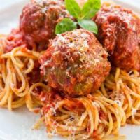 Spaghetti con Polpettine · Savory Italian meatballs sauteed with chopped tomatoes, basil, garlic, white wine, and tomat...