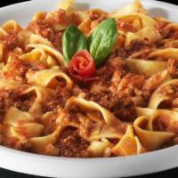 Fettuccine alla Bolognese · Fettuccine served with our version of beef sauce.