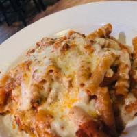 Baked Ziti · Baked ziti with meat sauce, ricotta cheese, and melted mozzarella.