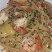 Fettuccine Gamberoni alla Carciofi · Sauteed jumbo shrimp with extra virgin olive oil, garlic, fresh lemon sauce, artichokes, tom...
