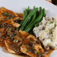 Pollo Marsala · Chicken sauteed with wild mushrooms in a Marsala wine sauce. Served with mashed potatoes and...