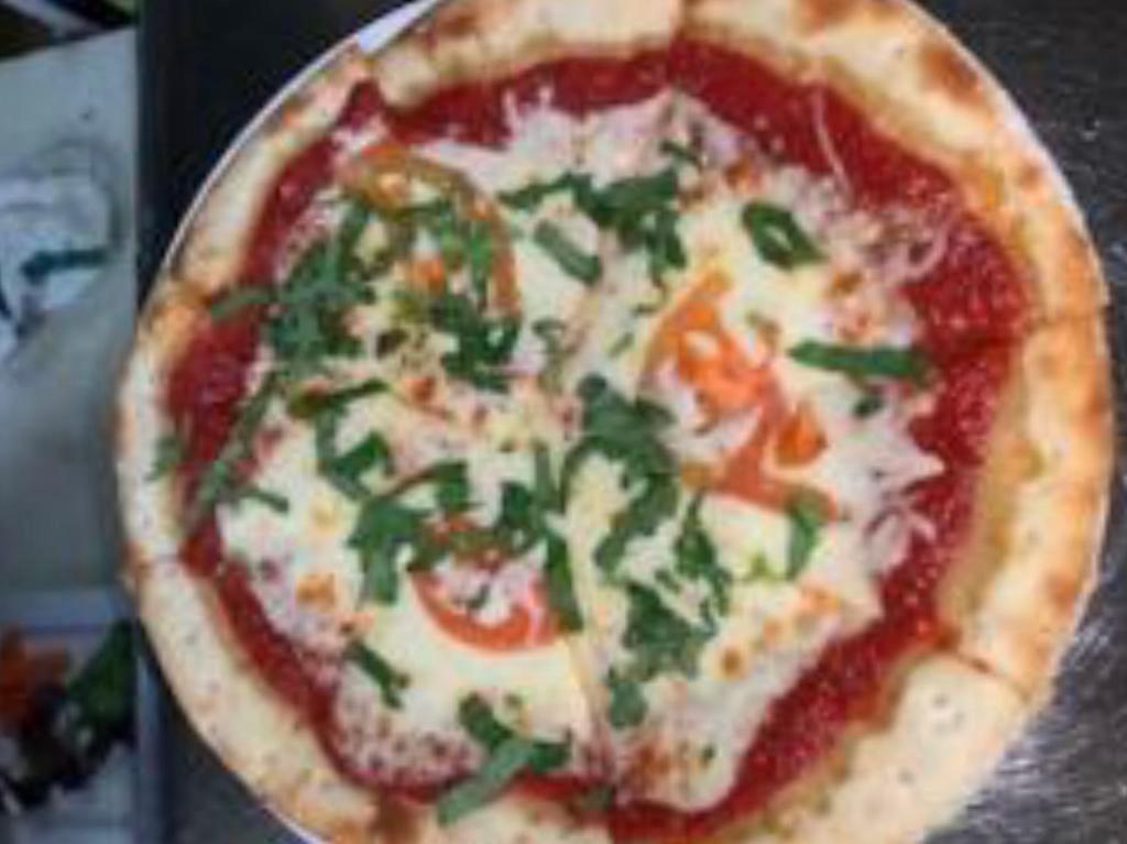 Margherita Pizza · Tomato sauce, fresh sliced tomatoes, basil, and mozzarella slices.