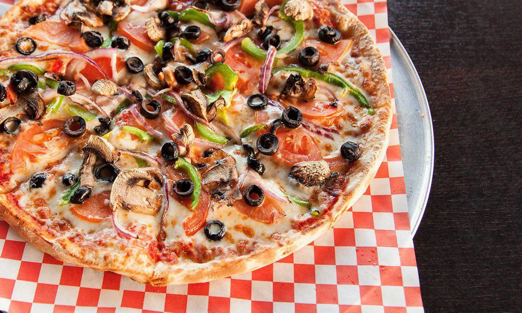 Primavera Pizza · Red onions, roasted red pepper, mushrooms, artichokes, olives, garlic, and sun dried tomatoes.