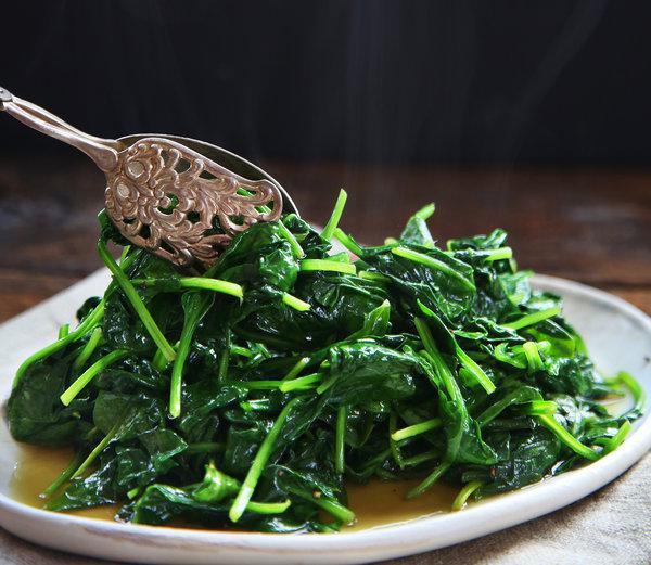 Spinach · Prepared either steamed or sauteed with oil and garlic.