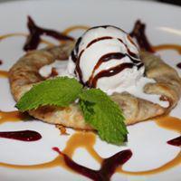 Apple Tart · Granny Smith apples spiced with cinnamon, sugar and nutmeg, baked in flaky pastry, served wi...