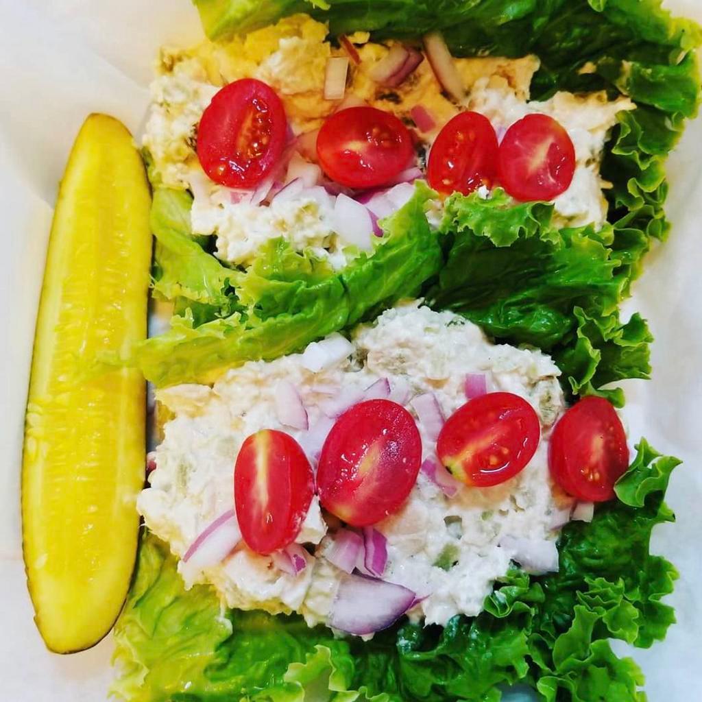 Lettuce Wraps · 2 romaine hearts [wraps] with tuna or chicken salad topped with red onions and cherry tomatoes.
