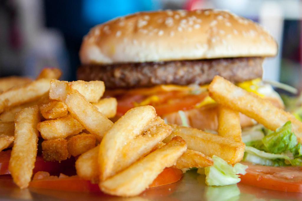 Cheeseburger Combo · Served with mayo, lettuce, onions and tomato. Comes with fries and drink.