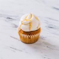 Salted Caramel Cupcake · An airy white cake with caramel buttercream frosting.