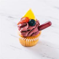 Sangria Cupcakes · A orange zest cupcake with a wine reduction buttercream topped with fresh fruit and a dopple...